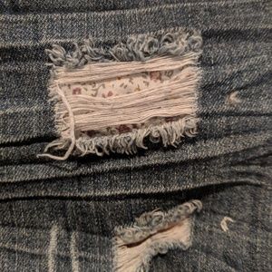 Distressed long jean shorts
